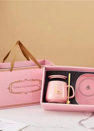 Чашка керамічна ніжно-рожева з підставкою - підігрівом та ложечкою в подарунковій упаковці