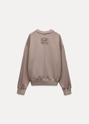 Укорочений світшот з етикеткою zara