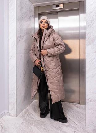 Зимове жіноче пальто великих розмірів