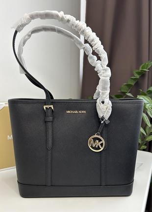 Кожаная сумка michael kors jet set travel small