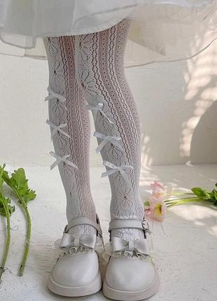 Ажурные колготы с бантиками для девочки
