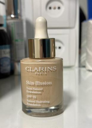 Тональний clarins skin illusion foundation spf 15