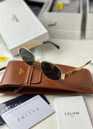 Окуляри сонцезахисні жіночі в золотій оправі в стилі celine