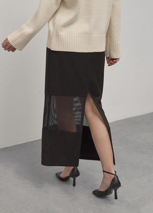 Юбка с прозрачной вставкой. новая.