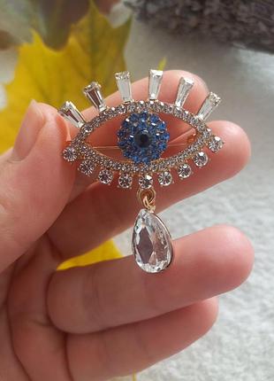 Брошка око 3