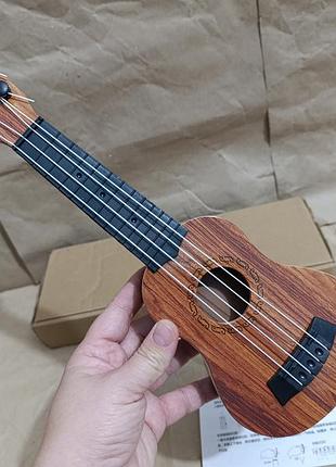 Новая детская музыкальная игрушка укулеле гитара 4 струны 35 см