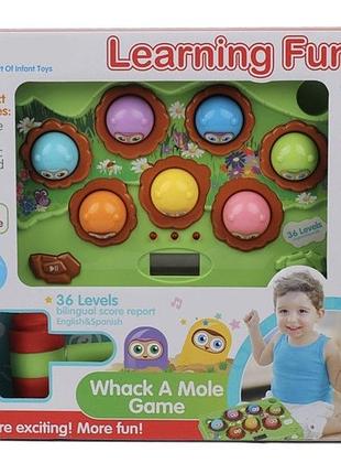 Развивающая электронная игра с молоточком