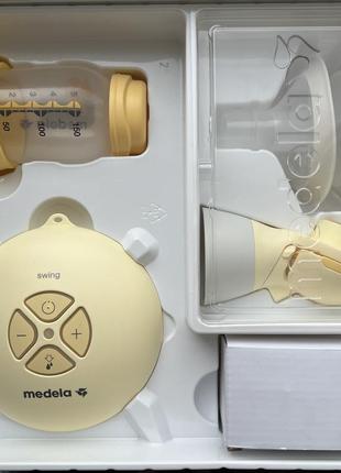 Электрический молокоотсос medela