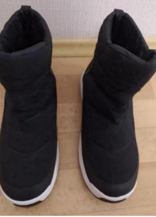 Новые ( без бумажной бирки),ботинки-дутики the north face,700
