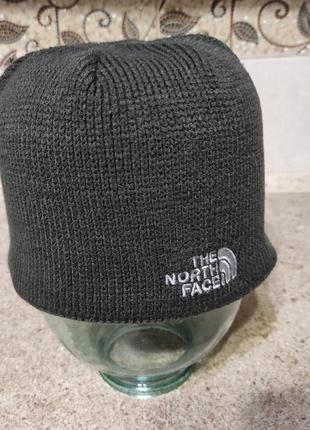 The north face  тепла шапка.