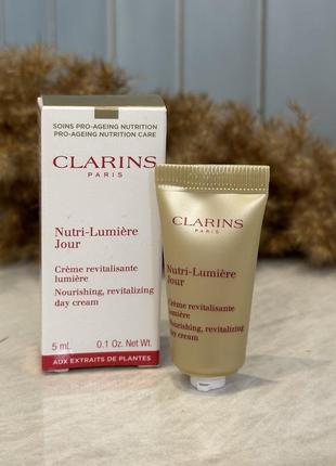 Оригінал денний омолоджувальний крем clarins nutri-lumière day cream
