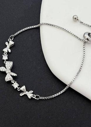 Браслет очаровательные бантики, длина до 24 см на затяжках, серебряное покрытие 925 пробы