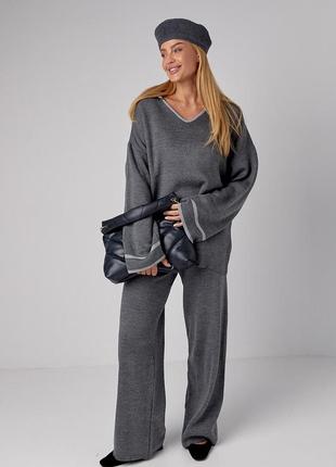 Жіночий костюм oversize з вільними штанами та кофтою-поло вʼязаний костюм