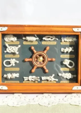 Цікаве настінне панно- картина з різними видами морських вузлів з їх назвами.