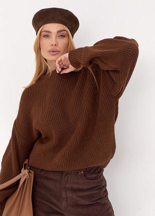 Жіночий теплий джемпер крупної в'язки.