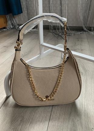 Шкіряна брендова сумка michael kors оригінал бежевого кольору