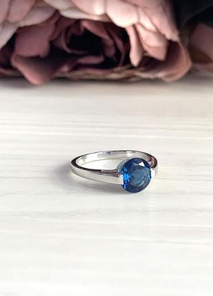 Серебряное кольцо с топазом лондон блю 1.565ct (18см размер) 1966167