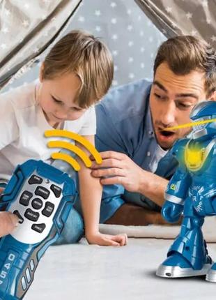 Інтерактивний робот, що танцює, dancing robot на пульті керування blue