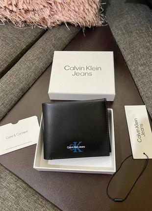 Кошелек calvin klein черный мужской с синим лого
