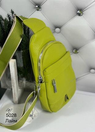 Женская стильная и качественная сумка слинг из эко кожи лайм3 фото