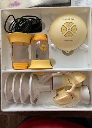 Medela електричний молоковідсмоктувач swing maxi flex + подарунок