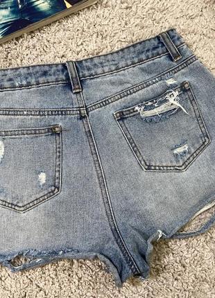 Короткие джинсовые шорты с потертостями No3114 фото