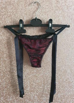 Мереживні стрінги з атласними бантами