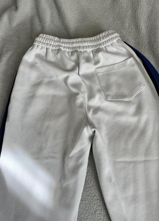 Белые спортивные штаны5 фото
