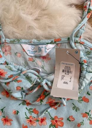 Топ синій з помаранчевим квітковим принтом primark розмір 364 фото