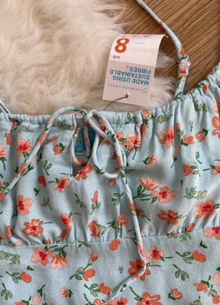 Топ синій з помаранчевим квітковим принтом primark розмір 363 фото