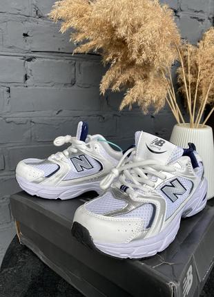 Кросівки білі жіночі new balance 5301 фото