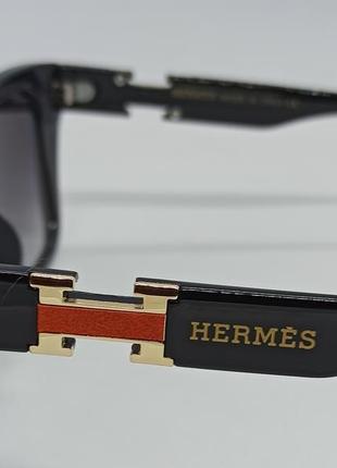 Очки в стиле hermes женские солнцезащитные черные с градиентом с золотым логотипом5 фото