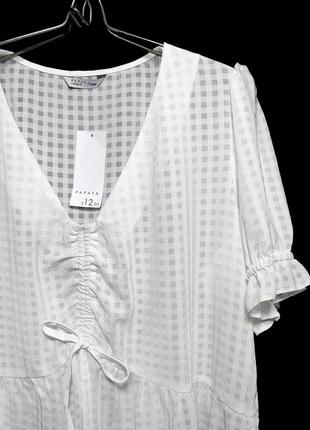 Білосніжна блуза в текстурну клітинку р.183 фото