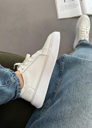 Жіночі білі шкіряні кеди