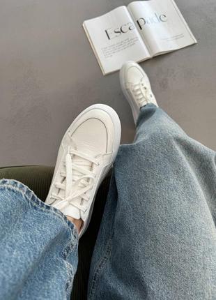 Жіночі білі шкіряні кеди