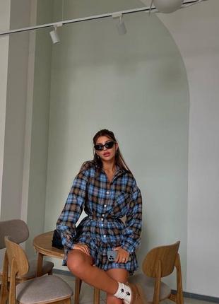 Костюм у клітинку зі спідницею