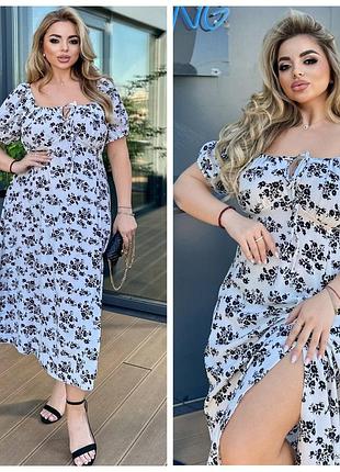 Стильное женское платье с разрезом батал