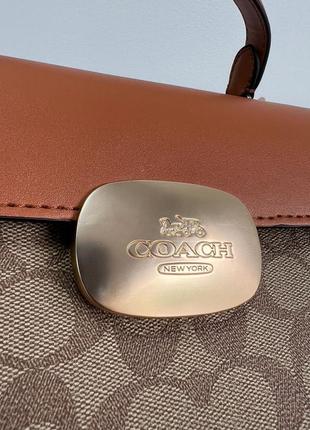 Сумка coach eliza top из гладкой кожи с металлическим лого.5 фото