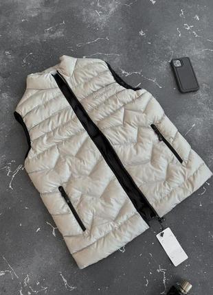 Жилетка columbia молочна