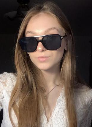 Сонцезахисні чорні окуляри в стилі поло