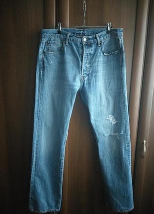 Джинсы levis501.(рваные)