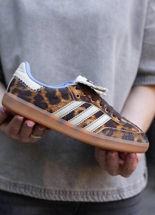 adidas gazelle stitch and turn blue paint walls