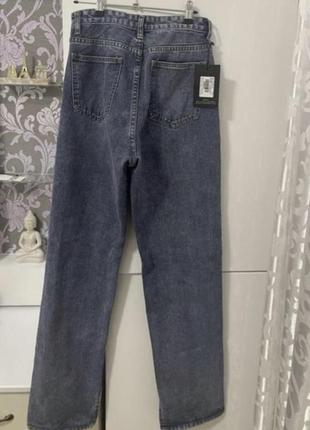 Шикарні нові  джинси з розрізами розмір м6 фото