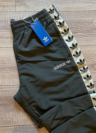 Спортивные штаны adidas лампасы2 фото
