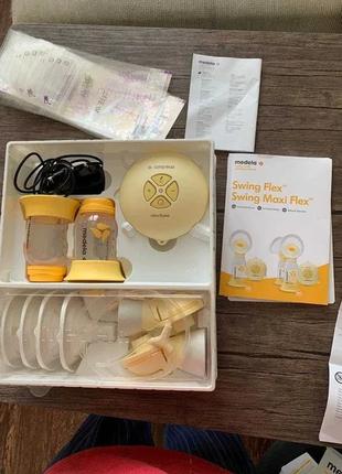 Medela електричний молоковідсмоктувач swing maxi flex + подарунок