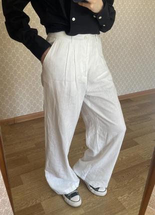 Білі льняні широкі штани палаццо