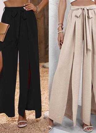 Однотонні жіночі палаццо штани розрізи висока прямі брюки софт легкі жіночі кюлоти кльош посадка класичні об‘ємні прямі широкі літо р