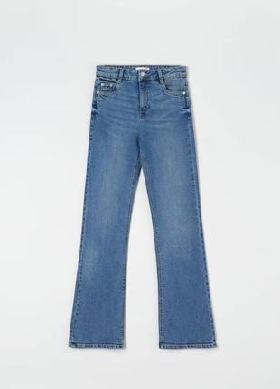 Розкльошені джинси3 фото