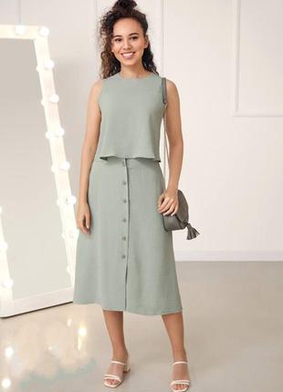 Літній жіночій костюм зі спідницею міді