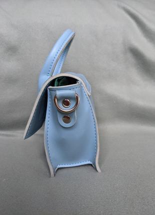 Мініатюрна модна маленька міні сумка з ручкою та ремінцем на плече3 фото